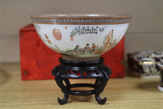 A Chinese egg shell porcelain bowl, wood stand and box